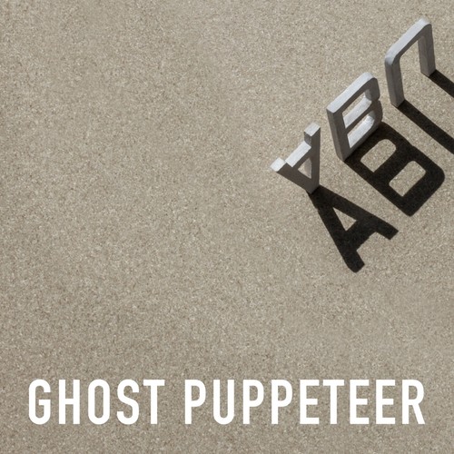Abu Nein – Ghost Puppeteer: silver three-dimensional letters spelling ABU stand on a beige textured surface, casting long shadows, with the title Ghost Puppeteer in white capitals along the bottom