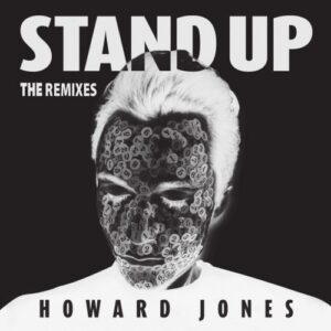 Howard Jones – Stand Up (The Remixes) cover: black-and-white inverted portrait of Howard Jones with eyes closed, his face covered in small numbered discs, under the white words STAND UP
