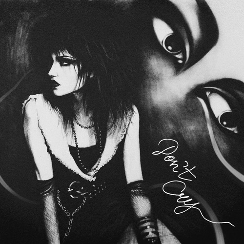 Vandal Moon – Don't Cry single cover: black-and-white artwork of a goth woman with teased dark hair, lace and chains, in front of a huge pair of painted eyes, with the title written in white script